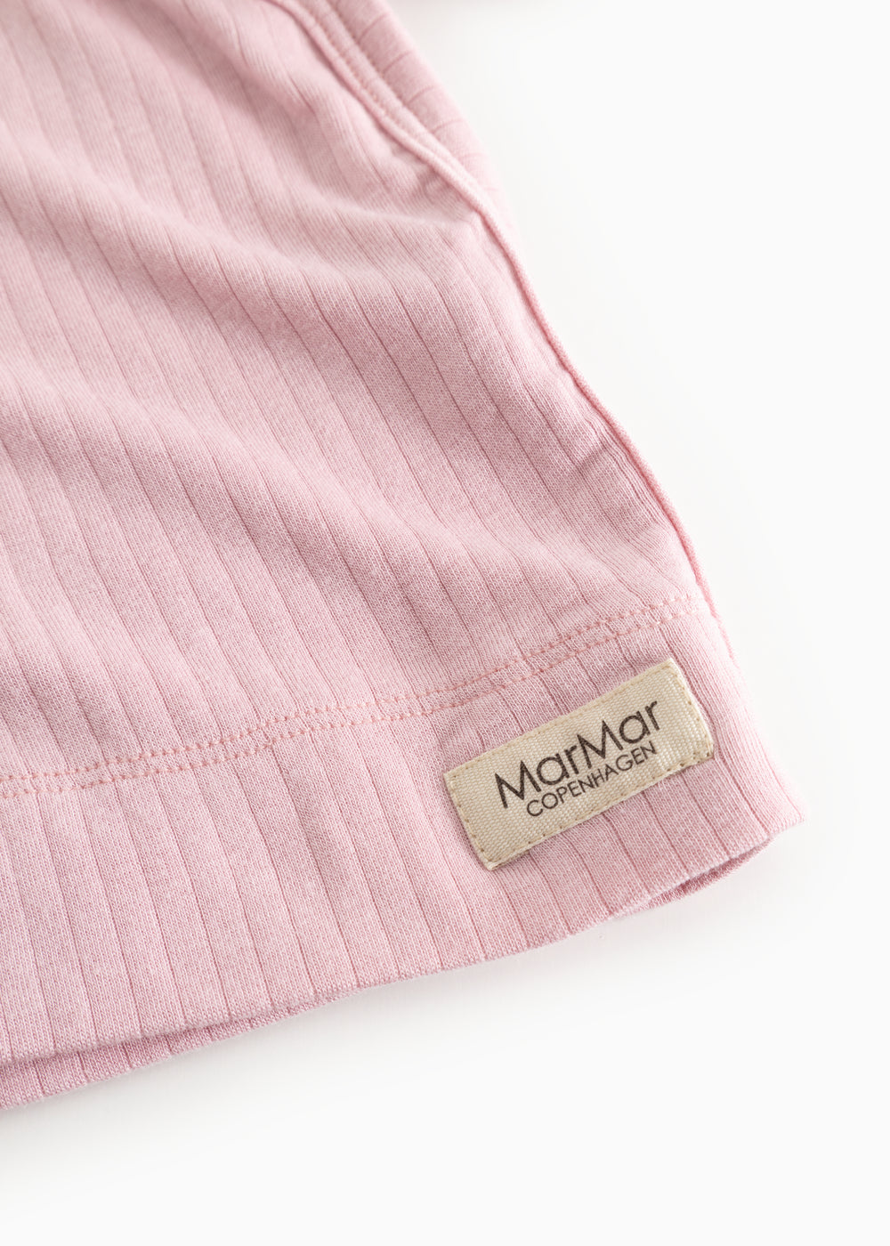 Pink long-sleeve blouse with ribbed edge and MarMar Copenhagen branding on the hem.