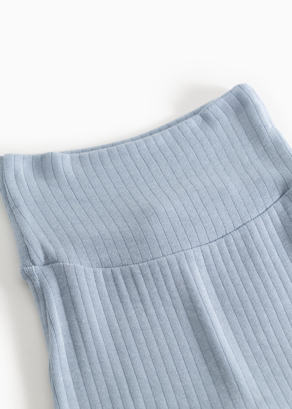 Light blue baby pants in rib knit with elastic waist and seams