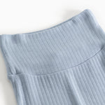 Light blue baby pants in rib knit with elastic waist and seams
