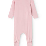 Pink jumpsuit with long sleeves and foot cuffs, seen from behind.