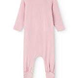 Pink jumpsuit with long sleeves and foot cuffs, seen from behind.
