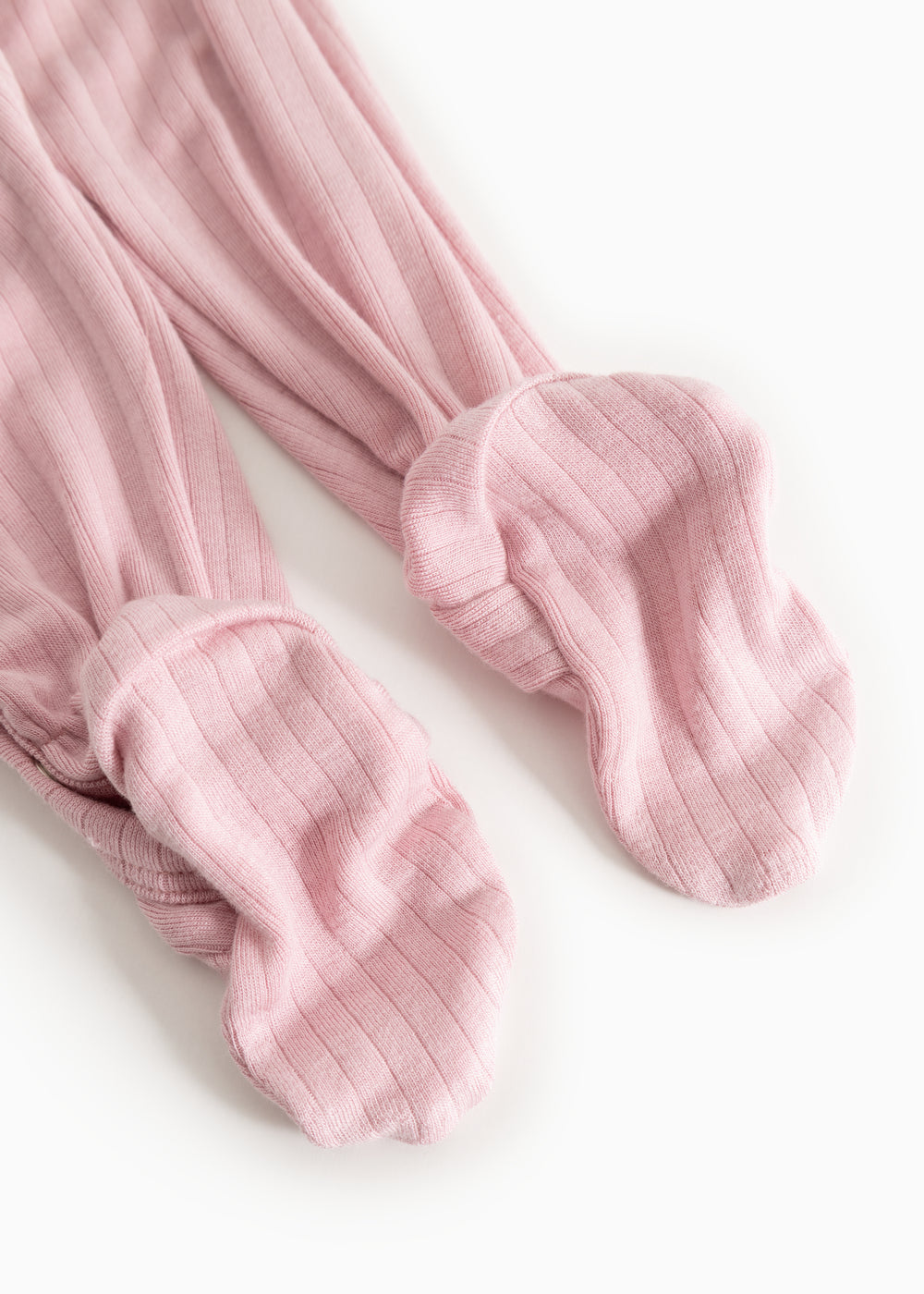 Pink baby onesie with ribbed cuffs at the ankles.