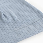 Blue ribbed knit hoodie, close fit, folded edge.