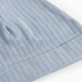 Blue ribbed knit hoodie, close fit, folded edge.