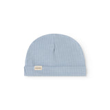 Blue ribbed knit hat with folded edge and small logo tag