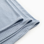 Alida rug in light blue with ribbed texture and rolled edge