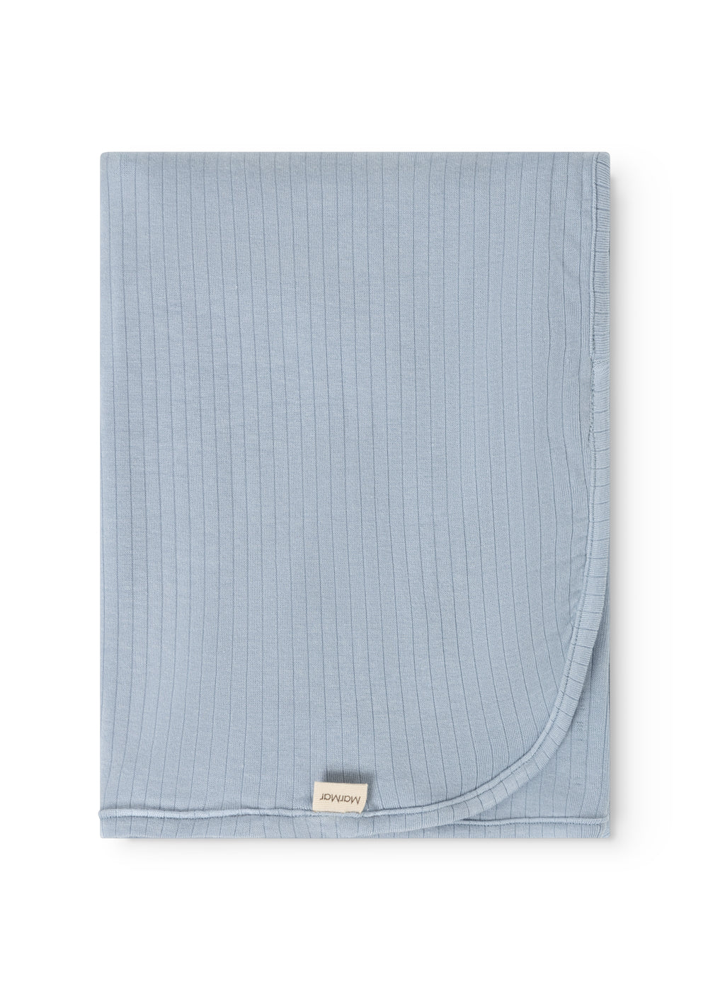 Alida rug in light blue, folded square with rounded edge and visible brand label.