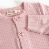 Pink baby jumpsuit with round neck, snap closure, and Mattmar brand at the collar.