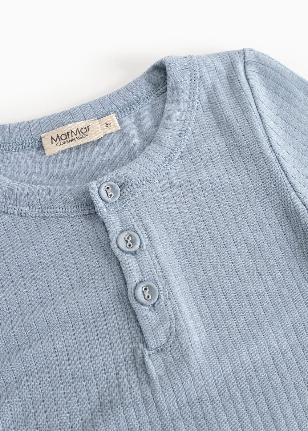 Light blue ribbed T‑shirt with a polo collar and three buttons at the neckline.