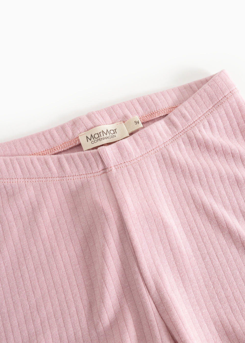 Pink leggings with elastic waistband and visible brand logo on the inside.