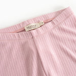 Pink leggings with elastic waistband and visible brand logo on the inside.