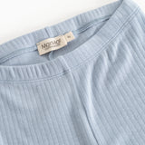 Light blue leggings with elastic waistband and ribbed seam detail.