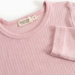 Pink evening dress with round neckline and rib pattern, MarMar brand at the neck.