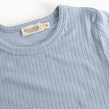Blue evening dress with collar and neckline, featuring a brand tag and ribbed pattern.