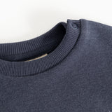 Round neckline with ribbed edge on dark navy blouse