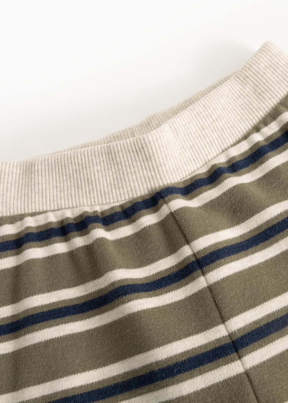 Kids' pants with ribbing at the waist and horizontal stripes in blue and gray.