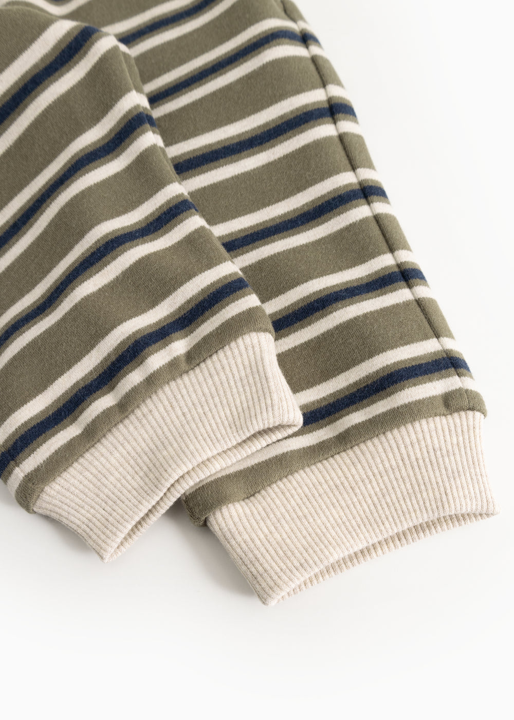 Kids' pants with ribbing at the legs and a striped pattern in blue and gray.