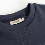 Dark blue blouse with round neck and ribbed edge, featuring Marmar Copenhagen brand.