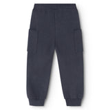 Blue denim children's pants with elastic waist and cargo pockets on the legs.