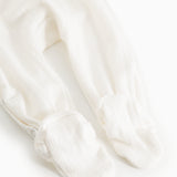Baby romper in cream white with long legs and feet