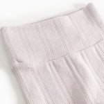 Baby pants with a close-up of a vertical pattern and elastic edge.