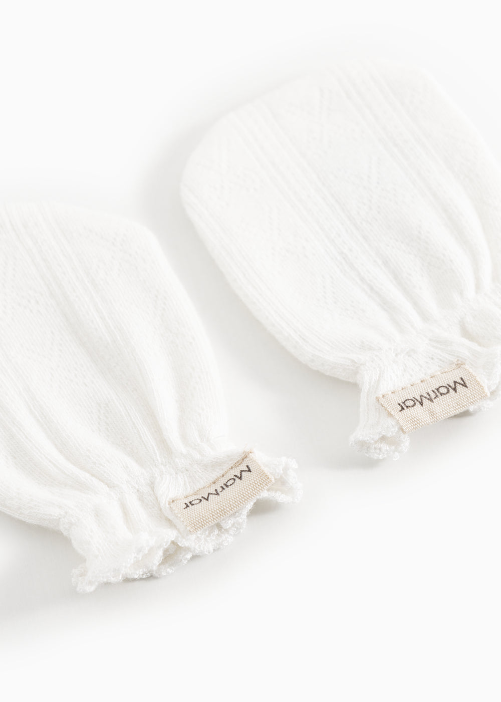 Fingerless gloves without elastic cuffs.
