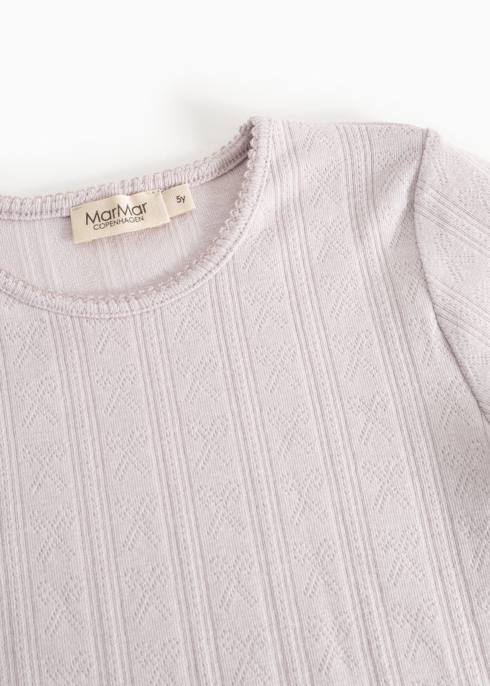 Kids T‑shirt in light purple with round neck and long‑sleeve textured pattern
