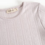 Kids T‑shirt in light purple with round neck and long‑sleeve textured pattern