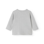 Light gray ribbed blouse with crew neck and long sleeves