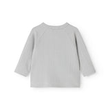 Light gray ribbed blouse with crew neck and long sleeves