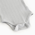 Sheer bodystocking in light gray-blue rib knit with elastic leg openings.