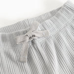 Baby tights with elastic waistband and front tie strap