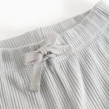 Baby tights with elastic waistband and front tie strap