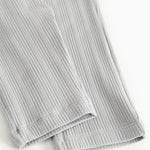 Baby pants with light blue stripes, ribbed edge at the bottom of the leg.
