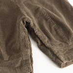 Riri B trousers with side seams and a raised edge in dark brown.