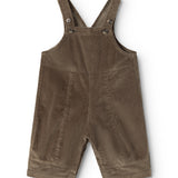 Riri B trousers in dark brown velvet rib with snap straps and short legs.