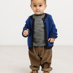 Baby onesies in dark brown velvet with elastic waist and loose legs for a toddler.