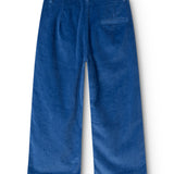 Dark blue velvet trousers seen from behind with straight legs and pocket details.