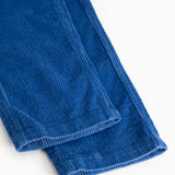 Blue velvet pants with a ribbed edge at the leg opening