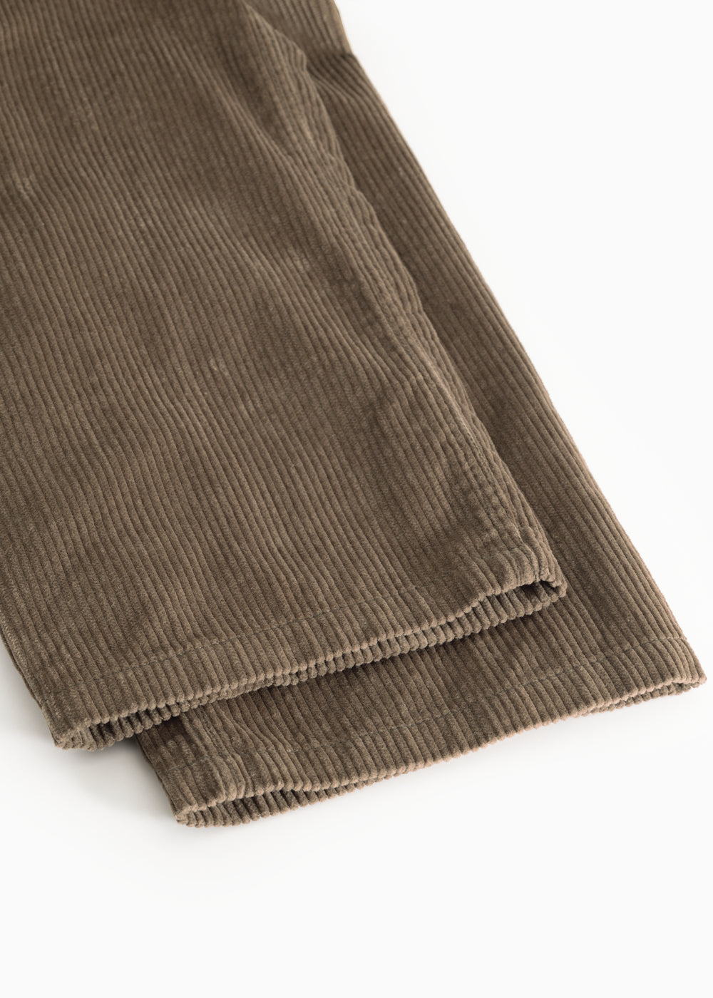 Pluto pants Wilted in brown corduroy, visible seam at the bottom.
