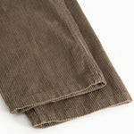 Pluto pants Wilted in brown corduroy, visible seam at the bottom.