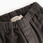 Leather Pants - Raven: elastic lining with drawstring, visible seam and label tag.