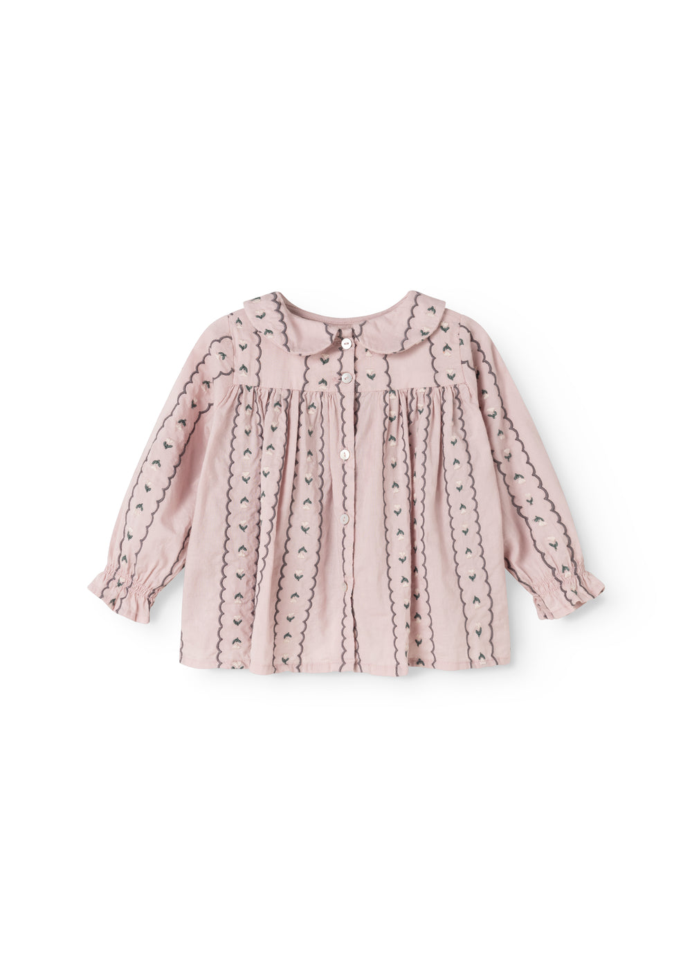 Pink baby blouse with pleated chest, button front and embroidered wave edges.