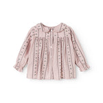 Pink baby blouse with pleated chest, button front and embroidered wave edges.