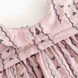 Pink blouse with high collar, front buttons and scalloped edge with embroidery