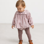 Barns dusty purple bloomers with vertical striped pattern and ruffles at the legs.