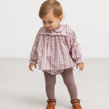 Barns dusty purple bloomers with vertical striped pattern and ruffles at the legs.
