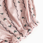 Dusty purple bloomers with patterned ribbons and ruffles at the leg openings.