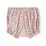 Powdered purple baby bloomers with elastic waistband and vertical pattern stripes.