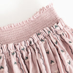 Skirt bottom: smock-waisted waist and patterned rows with green flowers